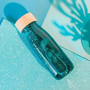 Sensorische Flasche FLOAT – Türkis - Tublu.de
