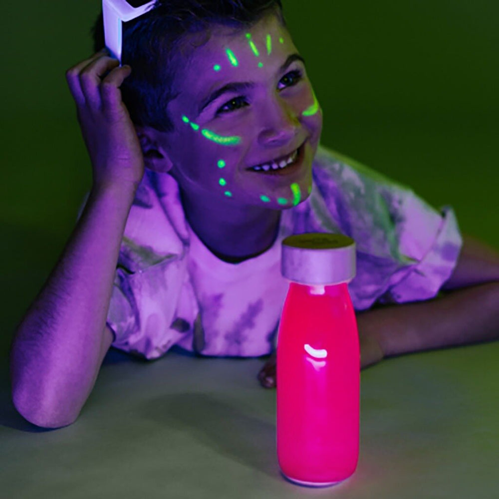 Sensorische Flasche FLOAT – Neonrosa - Tublu.de