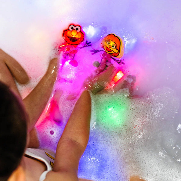 Im Wasser leuchtende Sensorikwürfel Elmo Sesamstraße – rot - Tublu.de