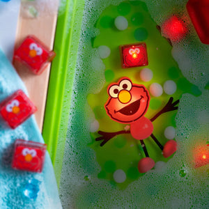 Im Wasser leuchtende Sensorikwürfel Elmo Sesamstraße – rot - Tublu.de