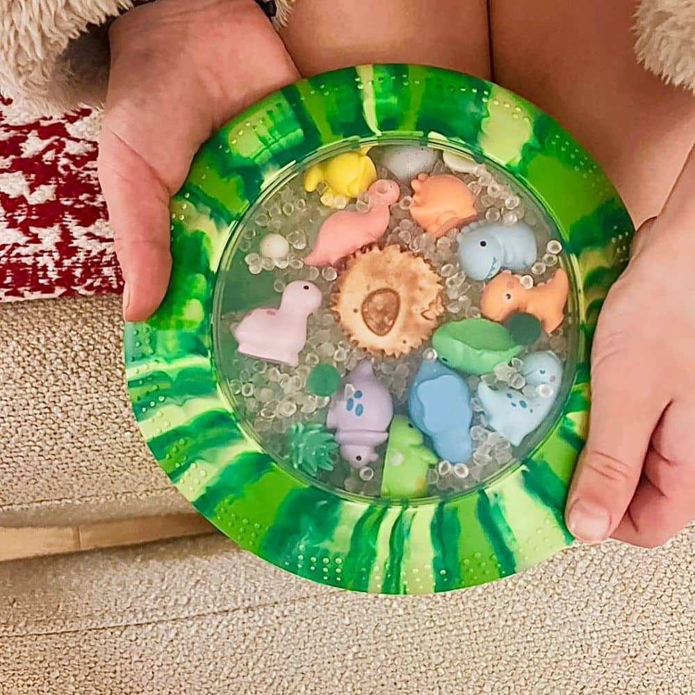 Senzorická disketa Peekaboo s figurkami - Dinosauři