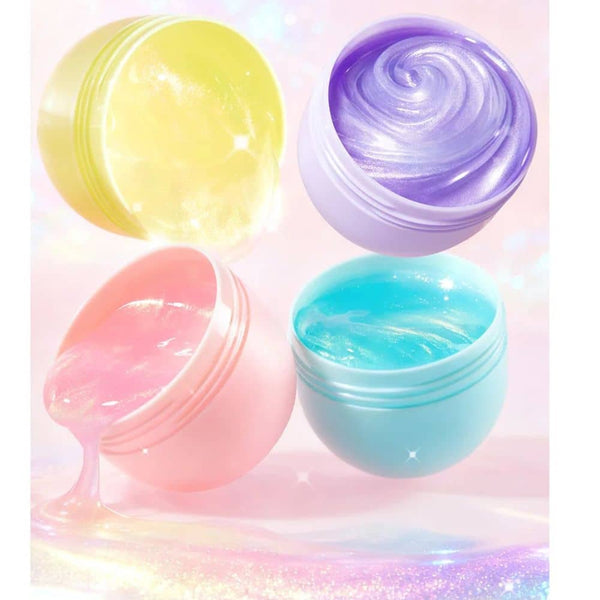 Vier geöffnete Dosen Pearly Putty in Gelb, Lila, Rosa und Türkis