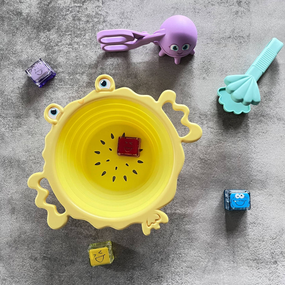 Glo Pals 5-in-1-Spielzeugset zur Förderung der Feinmotorik mit buntem Badewannenspielzeug in Gelb und Lila