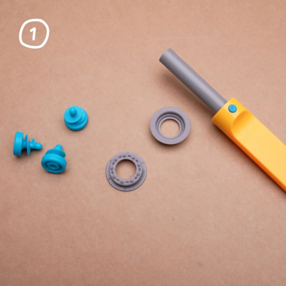 Satz von Roto-Ring 16 el. von Makedo mit grauen Kunststoffringen und Verpackung