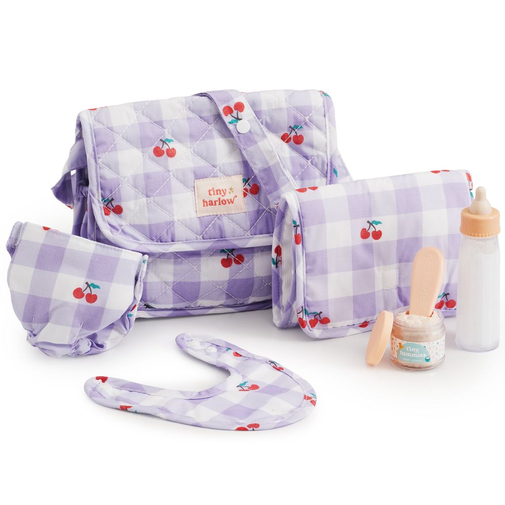 Puppenzubehör Tasche von Tiny Harlow mit lila Karo-Muster und Zubehör für Puppenspiele